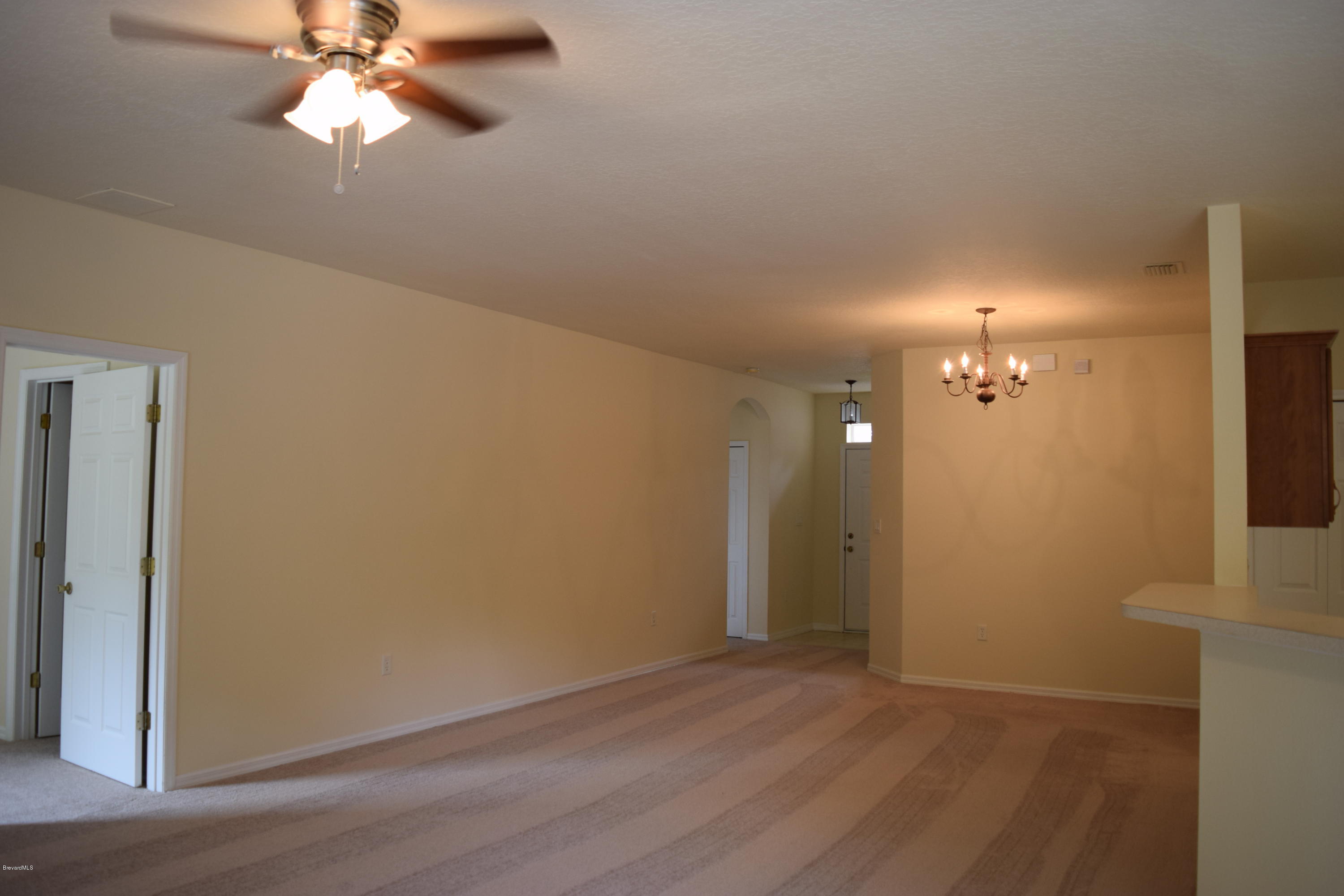 4120 Eola Avenue Titusville, FL 32796 - Photo 10 of 12 living room dining room