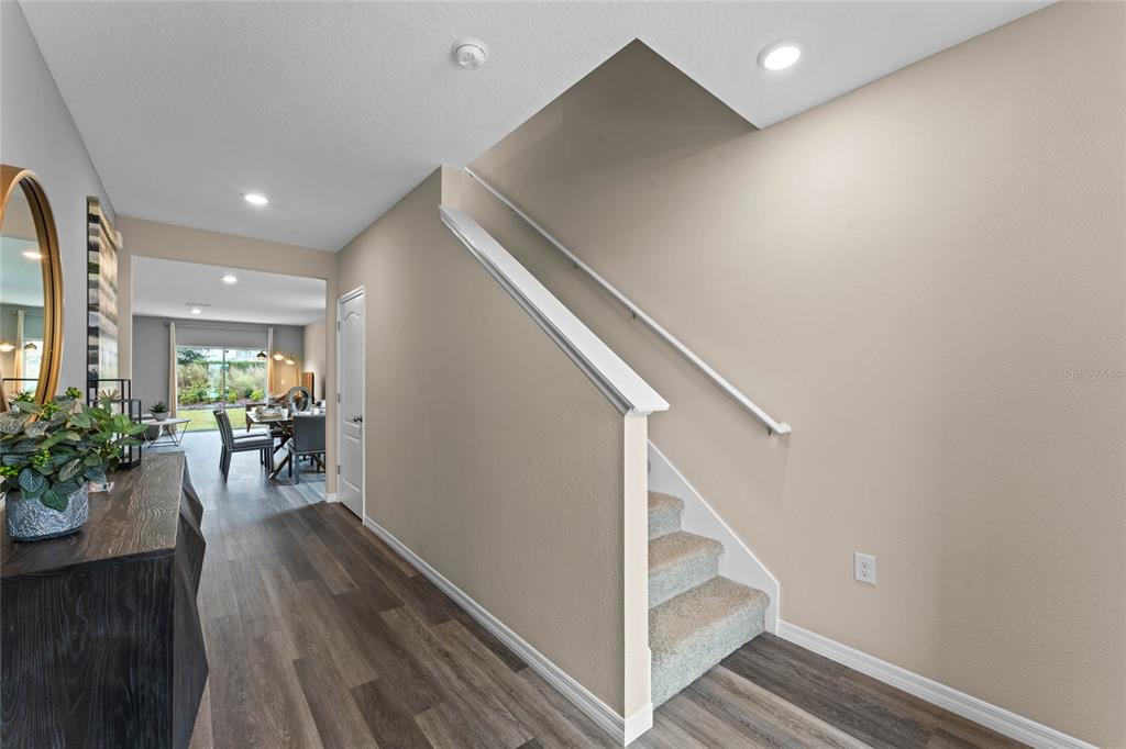 1816 Three Bars Road Kissimmee, FL 34744 - Photo 2 of 59 a view of entryway with livingroom and wooden floor