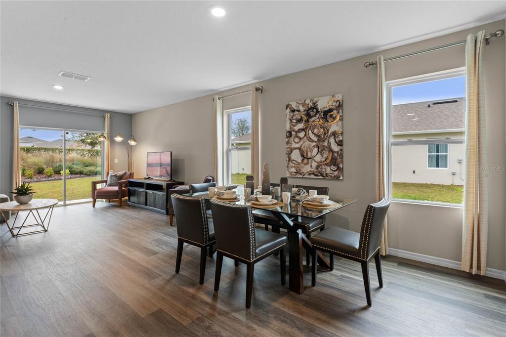 1816 Three Bars Road Kissimmee, FL 34744 - Photo 5 of 59 a view of a dining room with furniture window and outside view