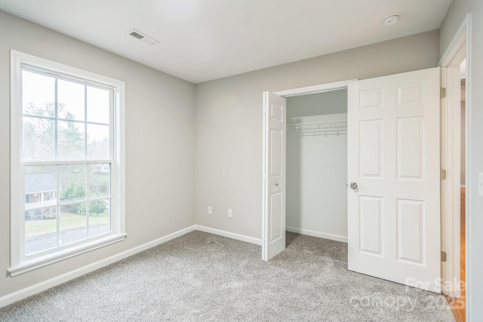 240 Doe Run Morganton, NC 28655 - Photo 13 of 15 an empty room with a window