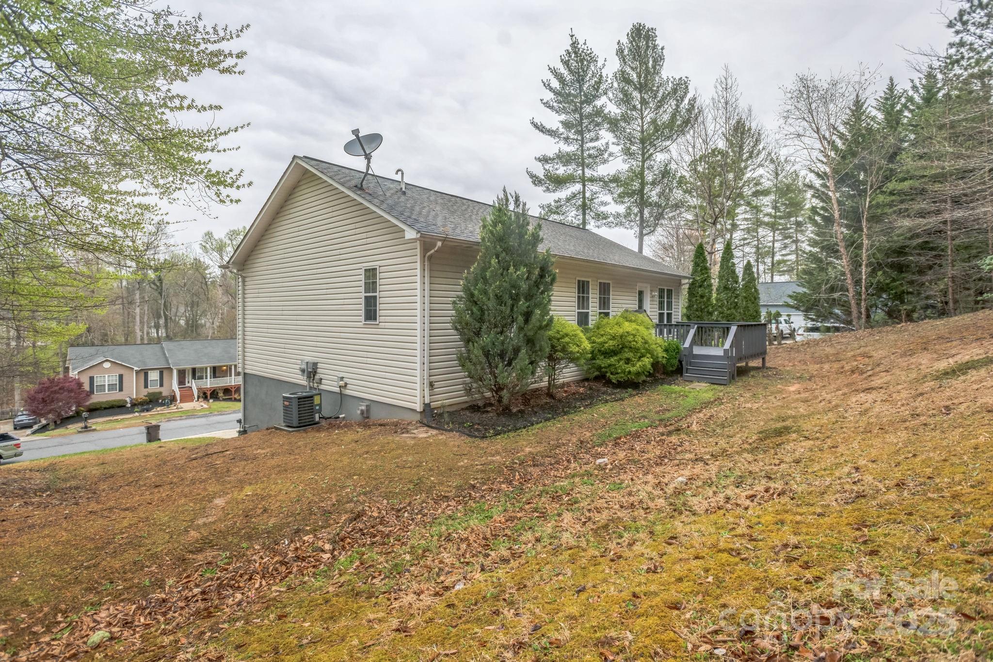 240 Doe Run Morganton, NC 28655 - Photo 5 of 15 a view of a house with a yard covered in snow