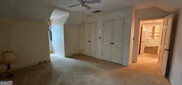 a bathroom with a sink a toilet and vanity