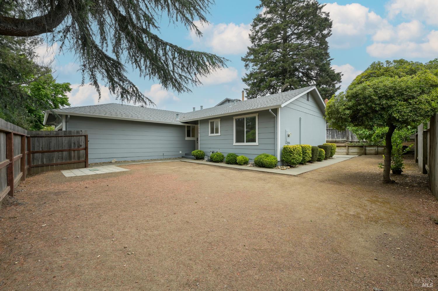 1536 Marlow Road Santa Rosa, CA 95401 - Photo 17 of 21 a view of a house with a yard and palm trees