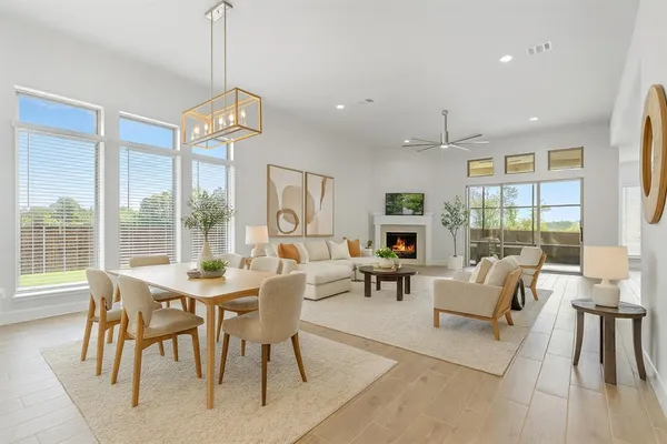 a view of a dining room with furniture window and outside view