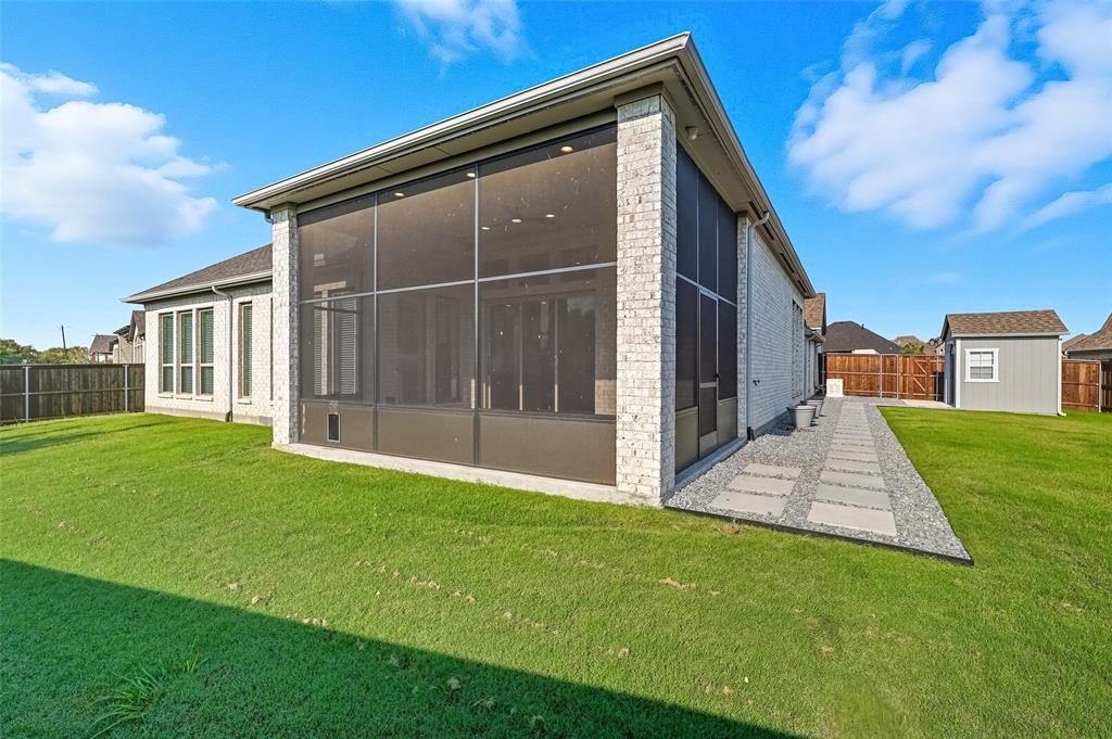 1557 Ripasso Way McLendon-Chisholm, TX 75032 - Photo 19 of 31 a view of a house with a yard