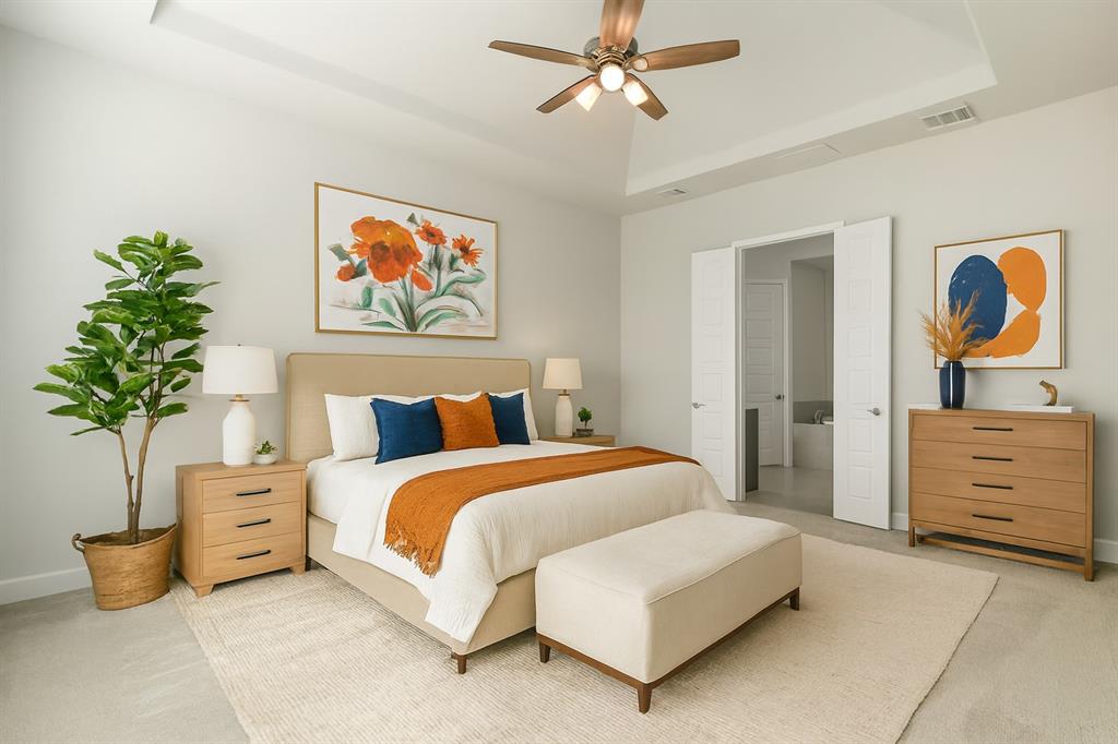 1557 Ripasso Way McLendon-Chisholm, TX 75032 - Photo 24 of 31 a spacious bedroom with a bed and a painting on the wall