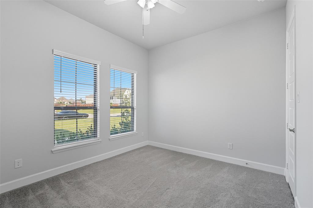1557 Ripasso Way McLendon-Chisholm, TX 75032 - Photo 4 of 31 an empty room with a window