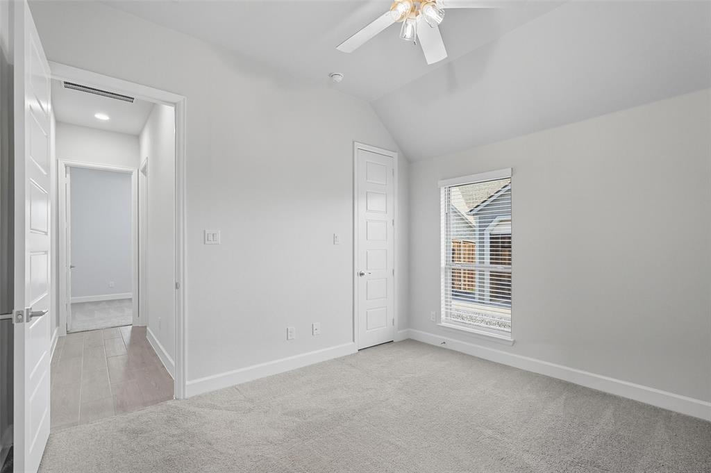 1557 Ripasso Way McLendon-Chisholm, TX 75032 - Photo 6 of 31 an empty room with windows and entrance