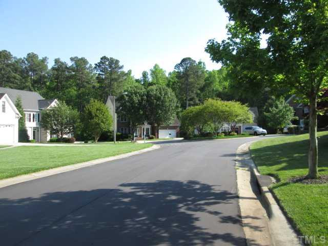 8120 Standing Stone Court Raleigh, NC 27613 - Photo 4 of 25 Street view of the culdesac from the side yard of this beautiful home! Great looking neighborhood minutes to to RTP to RDU and so much more! Other
