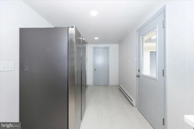 a view of hallway with an entryway