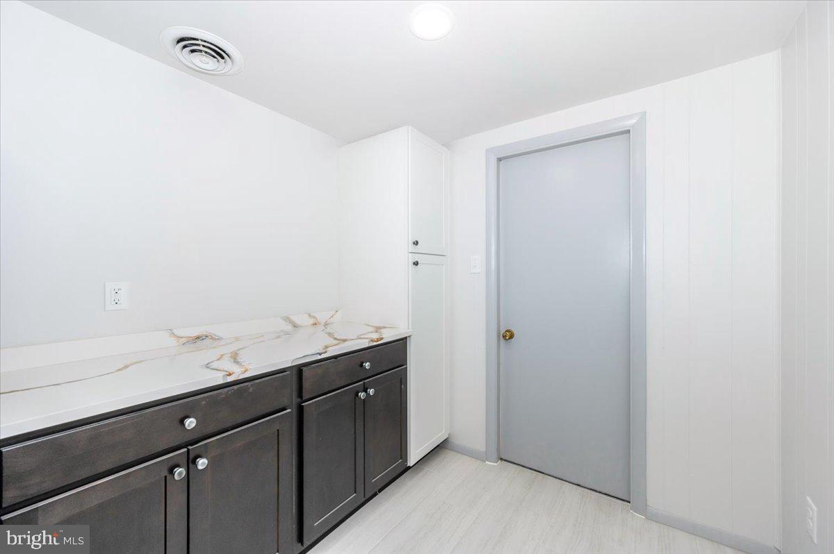6 Schaller Lane Smithsburg, MD 21783 - Photo 22 of 51 a bathroom with a granite countertop sink and a mirror