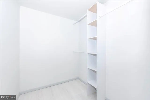 a view of an empty walk in closet