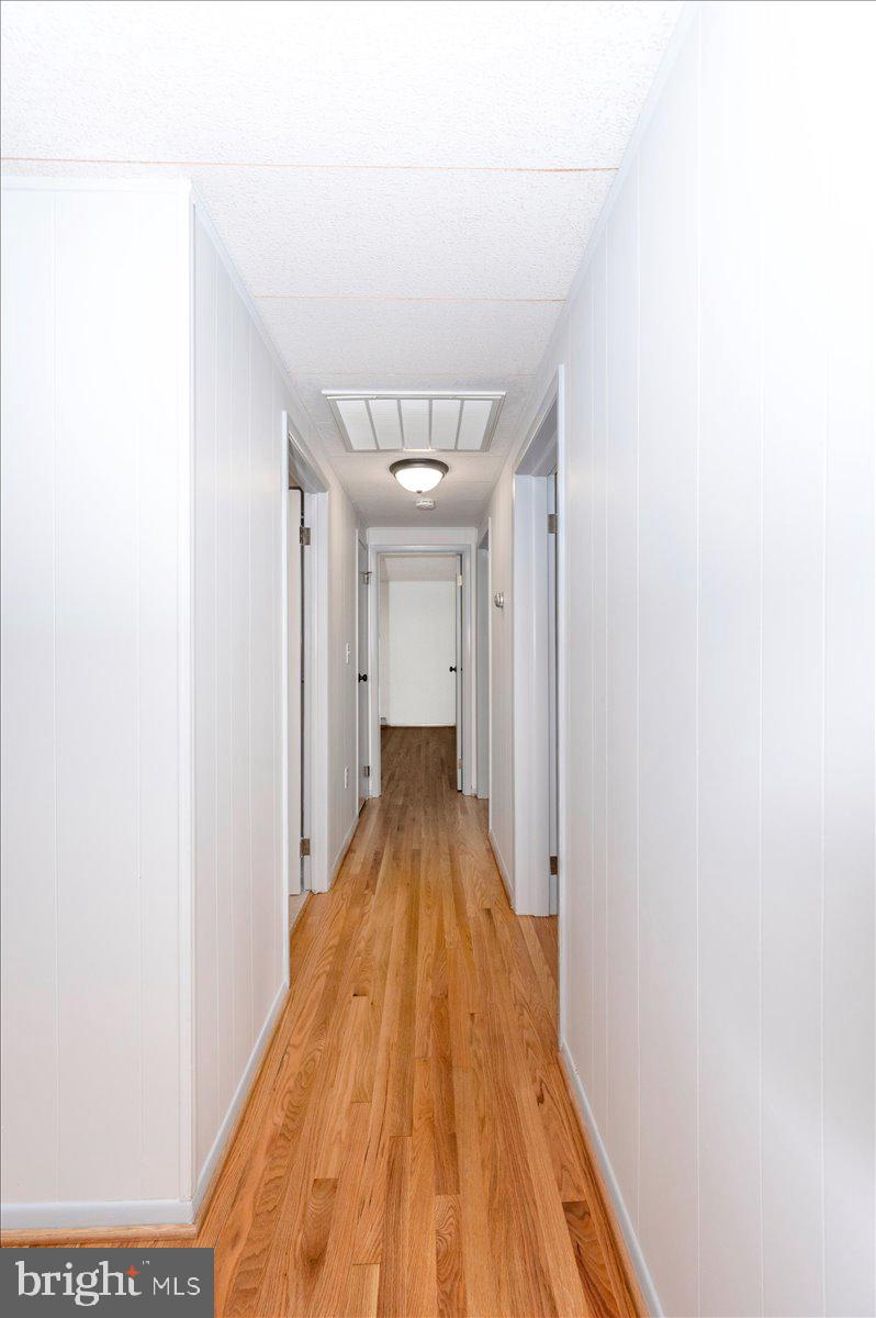6 Schaller Lane Smithsburg, MD 21783 - Photo 28 of 51 a view of a hallway with wooden floor