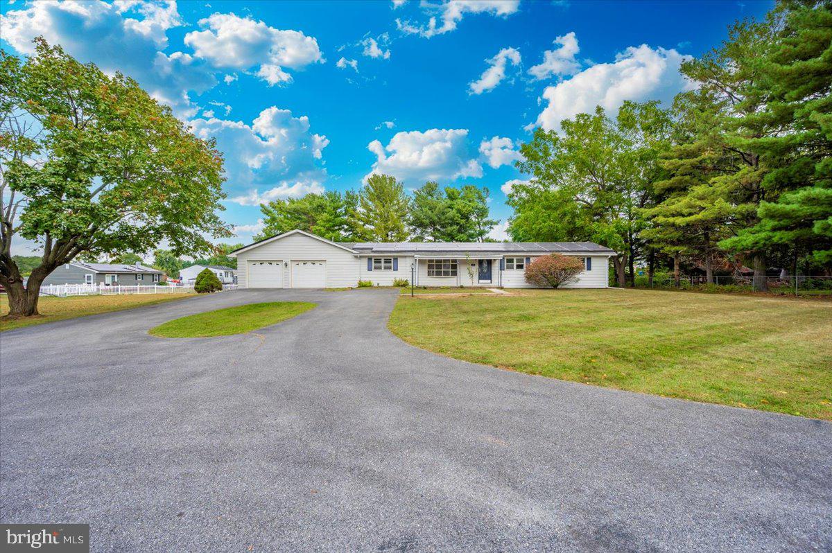 6 Schaller Lane Smithsburg, MD 21783 - Photo 3 of 51 a view of a swimming pool with an outdoor space and seating area