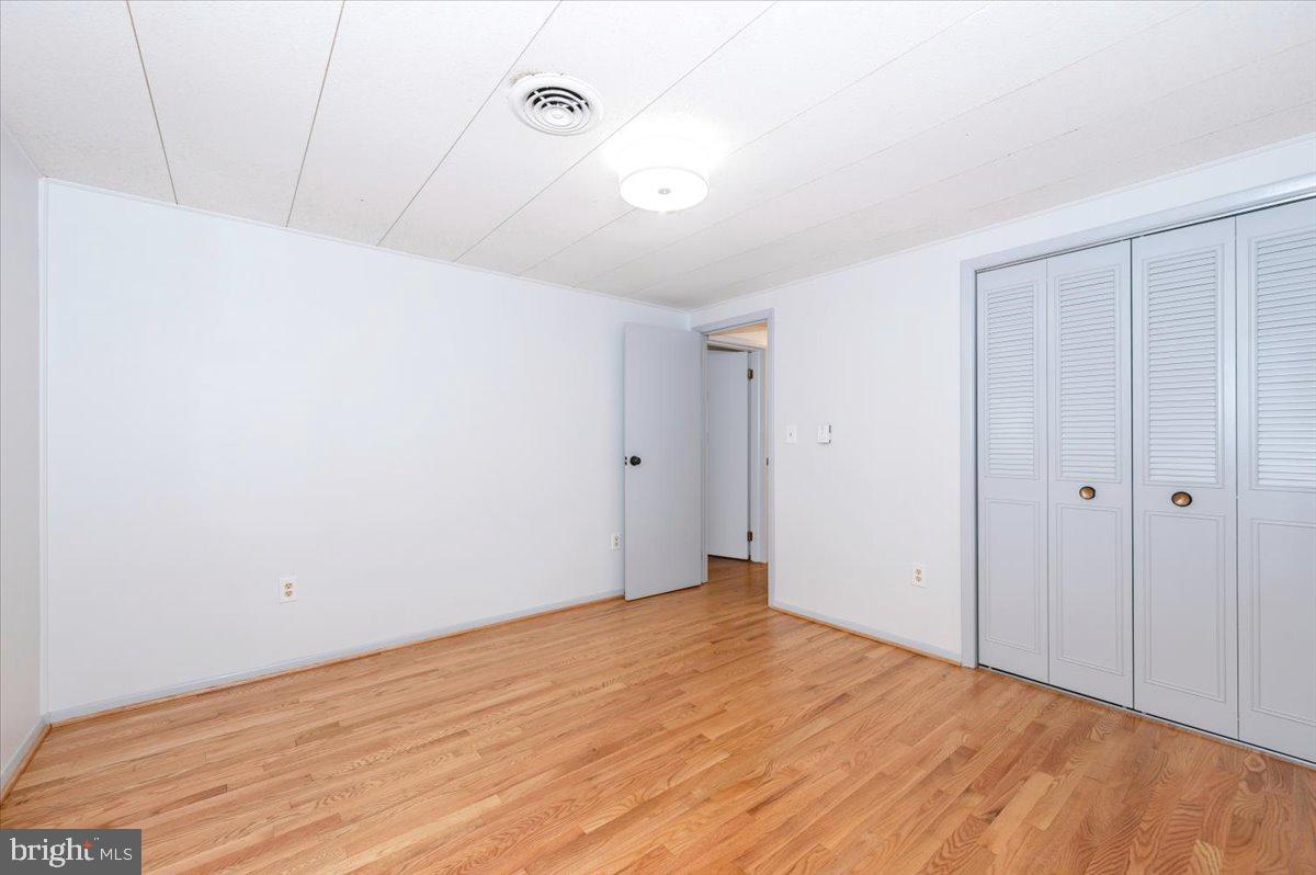 6 Schaller Lane Smithsburg, MD 21783 - Photo 34 of 51 a view of empty room with wooden floor