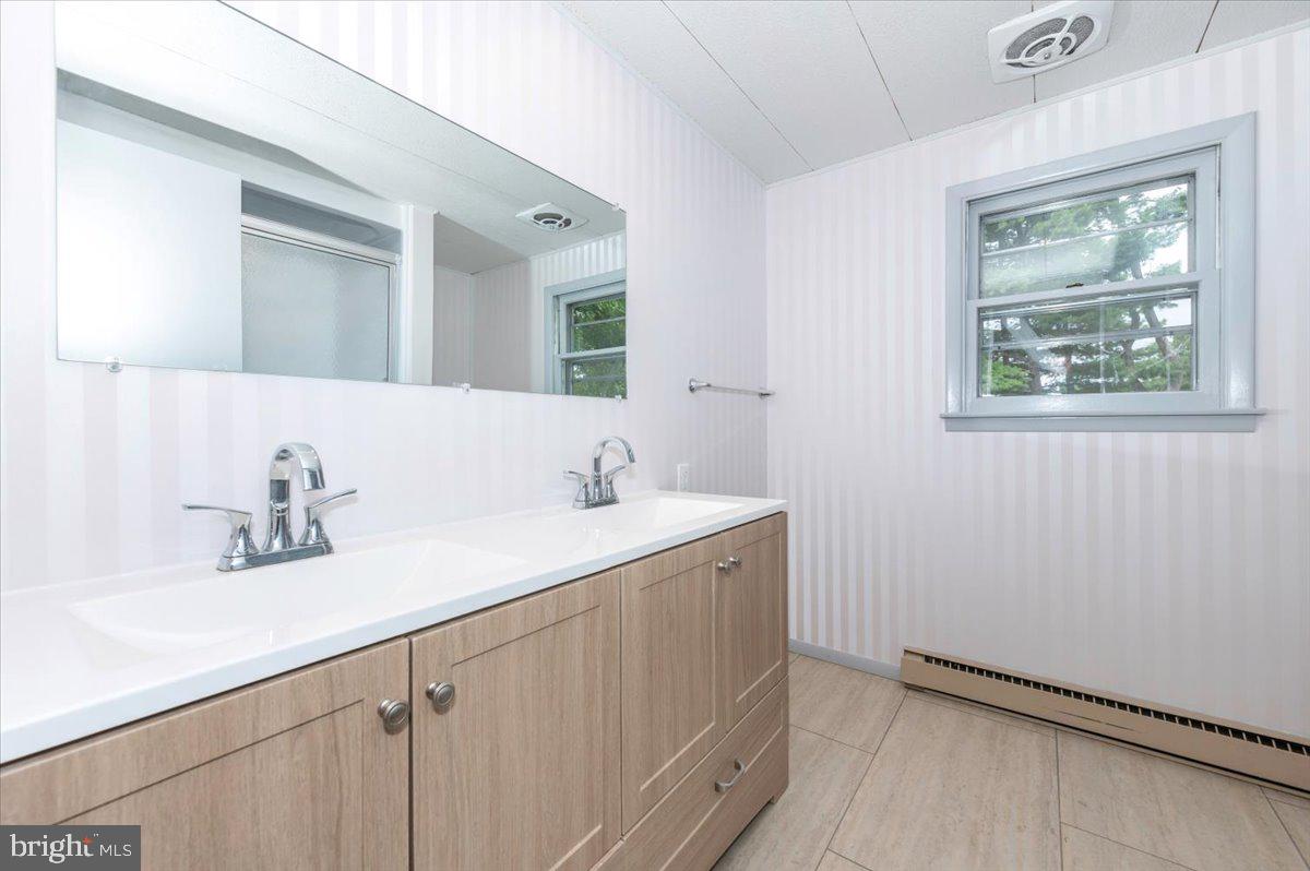 6 Schaller Lane Smithsburg, MD 21783 - Photo 35 of 51 a bathroom with a sink and a mirror