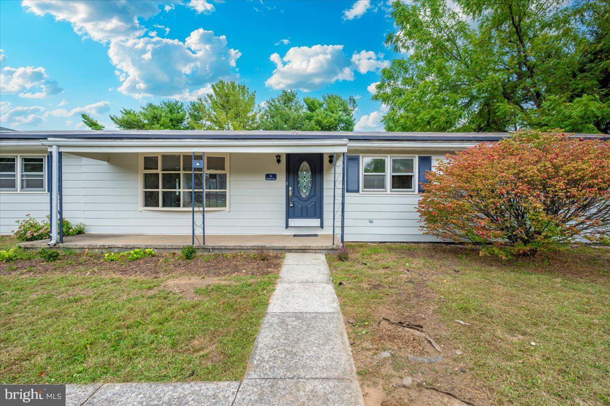 6 Schaller Lane Smithsburg, MD 21783 - Photo 6 of 51 a front view of a house with garden