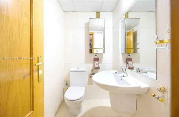 a bathroom with a sink and a toilet