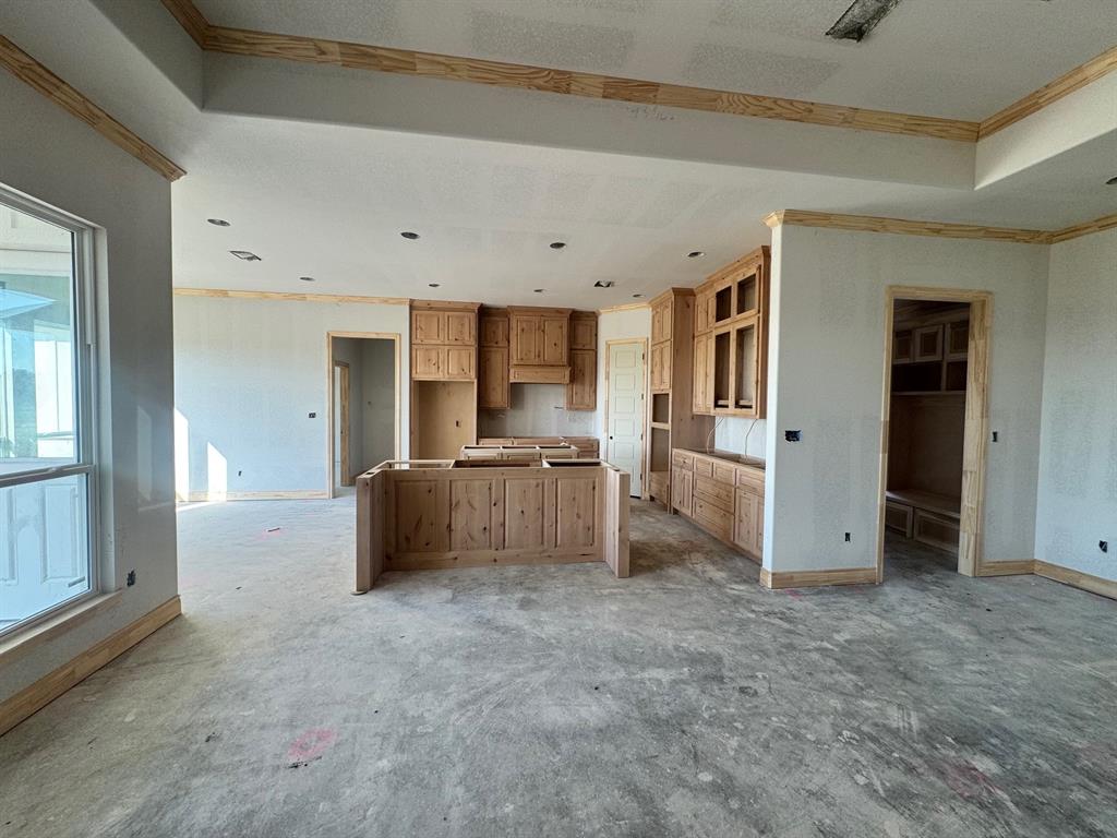 173 Willow Branch Road McGregor, TX 76657 - Photo 4 of 18 a view of a kitchen with refrigerator and a sink