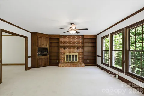 a big room with windows and closet