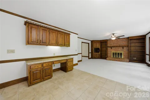 a view of a kitchen with a sink and a dishwasher