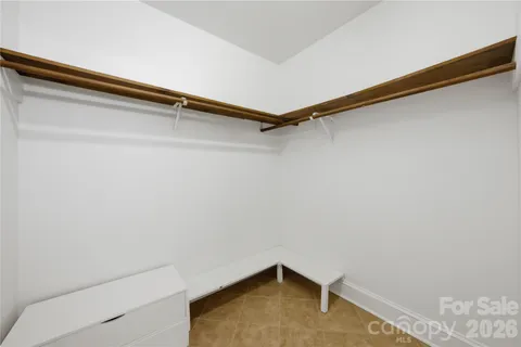 a small space with a sink and dishwasher