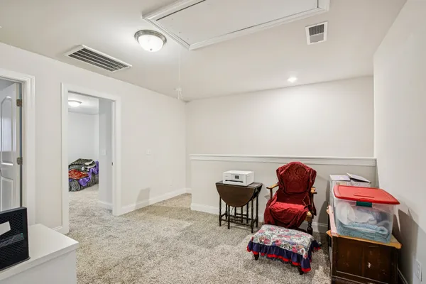 a room with furniture and toys