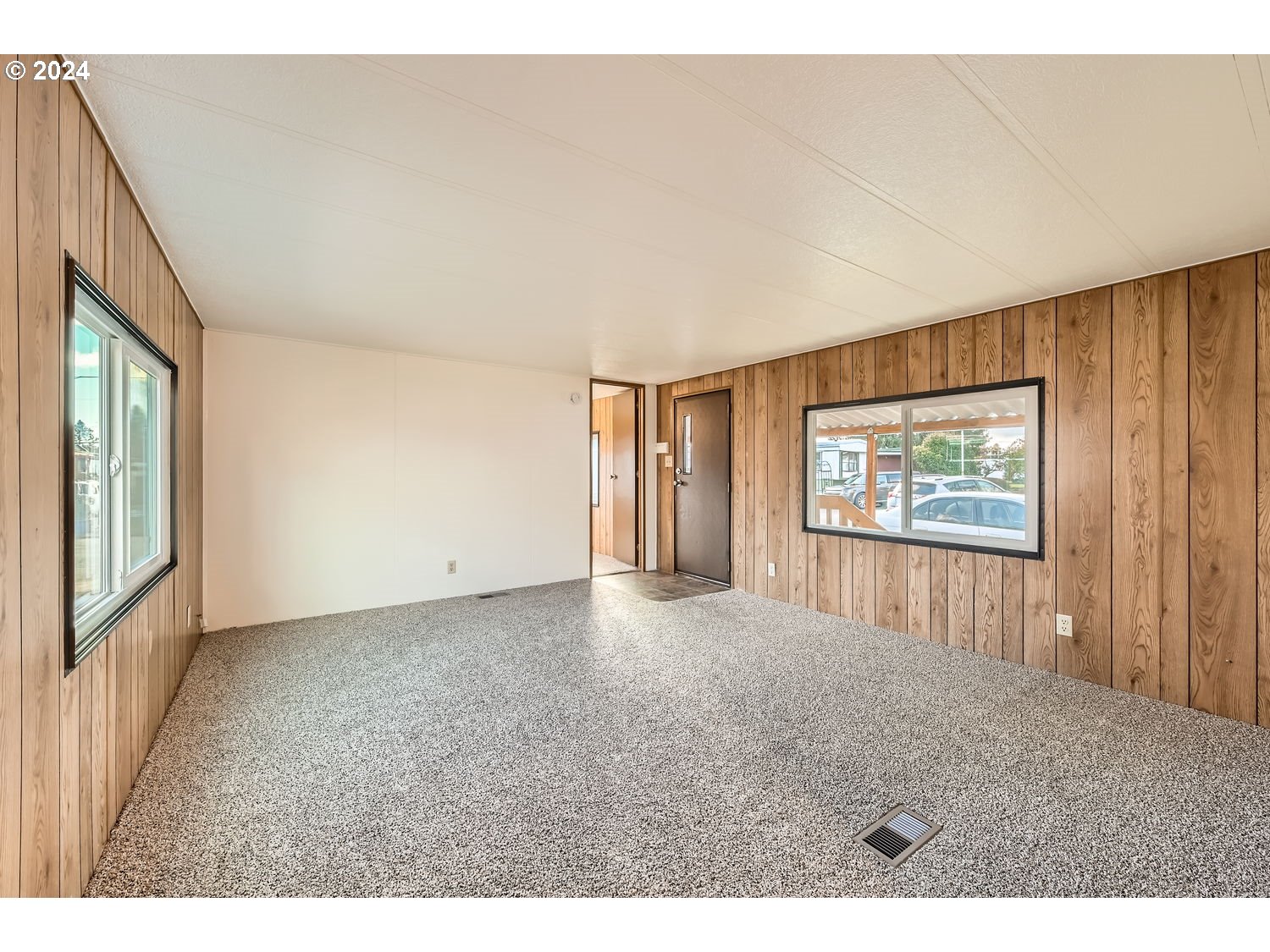 7227 Southeast Flavel Street, Unit 38 Portland, OR 97206 - Photo 5 of 14 a view interior of a house with a ceiling fan