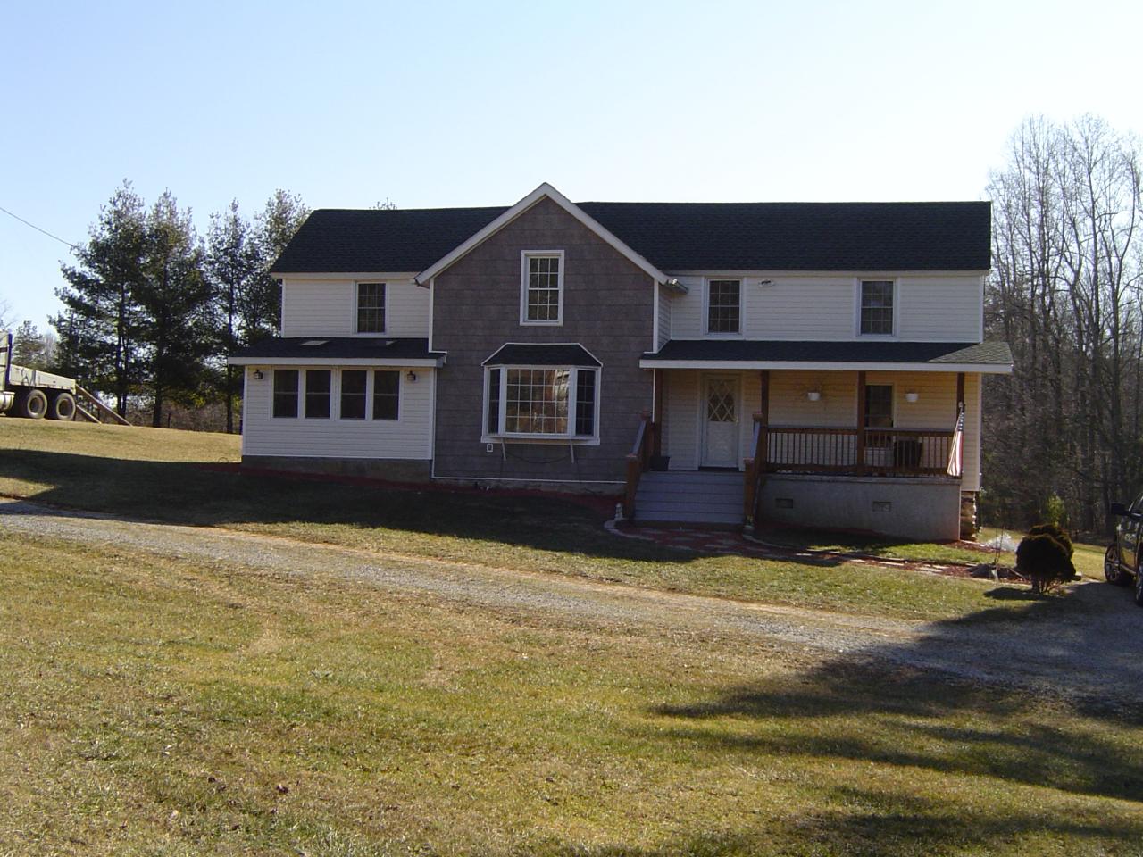 2130 6 Mile Post Road Callaway, VA 24067 - Photo 1 of 3 a house view with a garden space