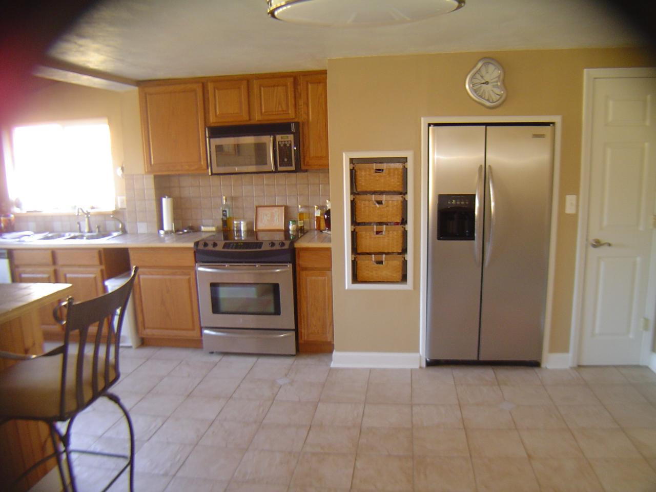 2130 6 Mile Post Road Callaway, VA 24067 - Photo 2 of 3 a kitchen with stainless steel appliances granite countertop a stove and a refrigerator