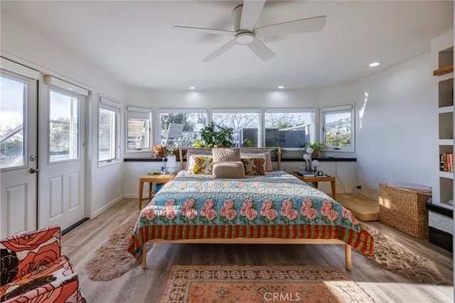 a bed room with bed and window