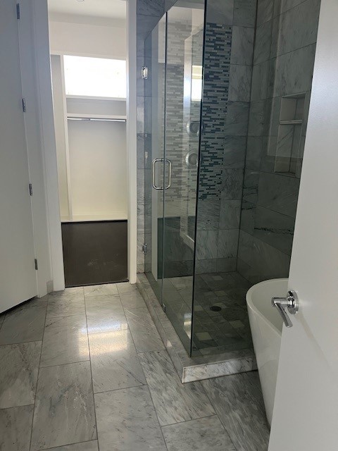 1253 Utah Street Houston, TX 77007 - Photo 11 of 14 a bathroom with a shower and toilet