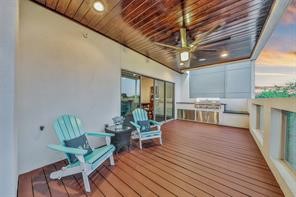 1253 Utah Street Houston, TX 77007 - Photo 3 of 14 a view of a dining room with furniture window and wooden floor