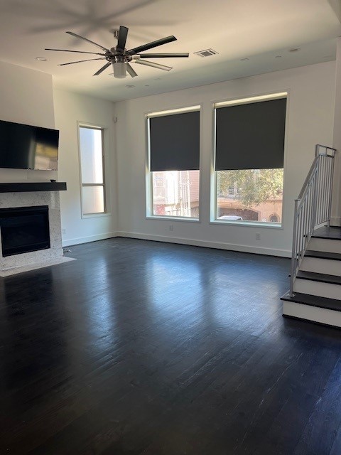 1253 Utah Street Houston, TX 77007 - Photo 6 of 14 a view of empty room with wooden floor and fireplace