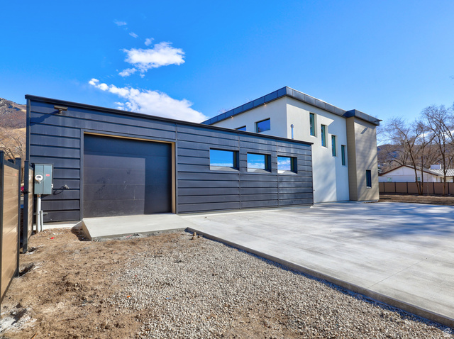 1306 East Victor Lane Draper, UT 84020 - Photo 50 of 60 View of side of property with driveway
