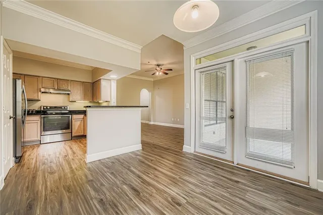 a view of kitchen with wooden floor