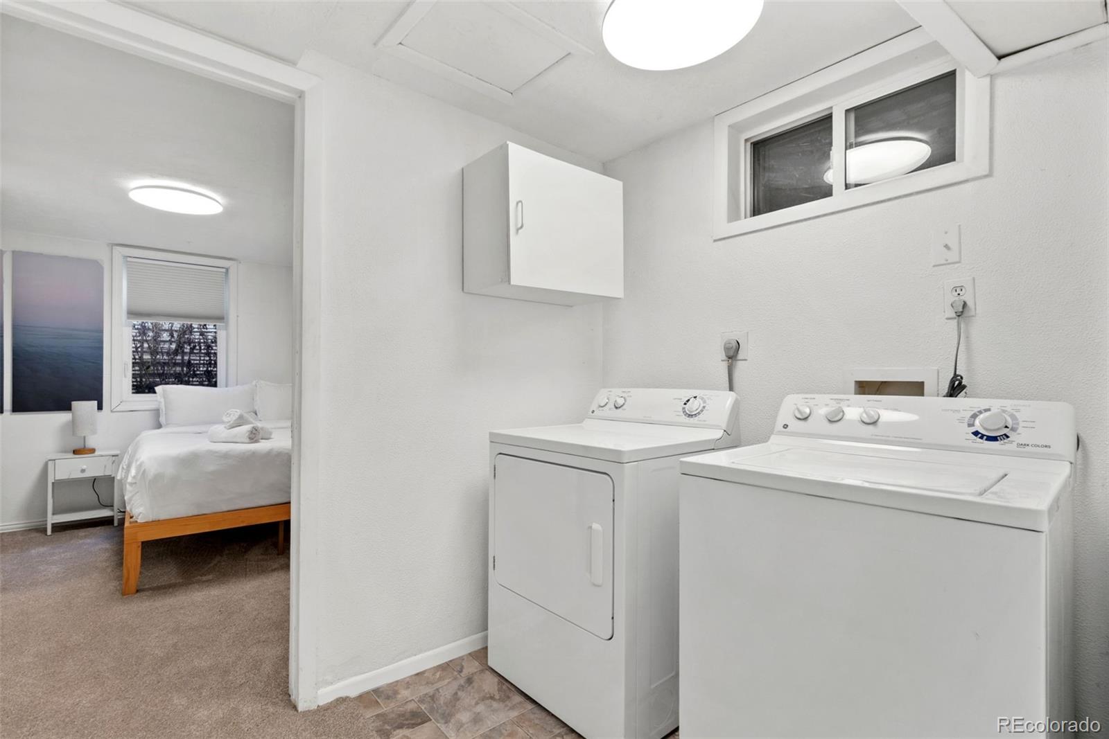 5533 Raritan Way Denver, CO 80221 - Photo 11 of 22 a view of bathroom with a sink and a mirror