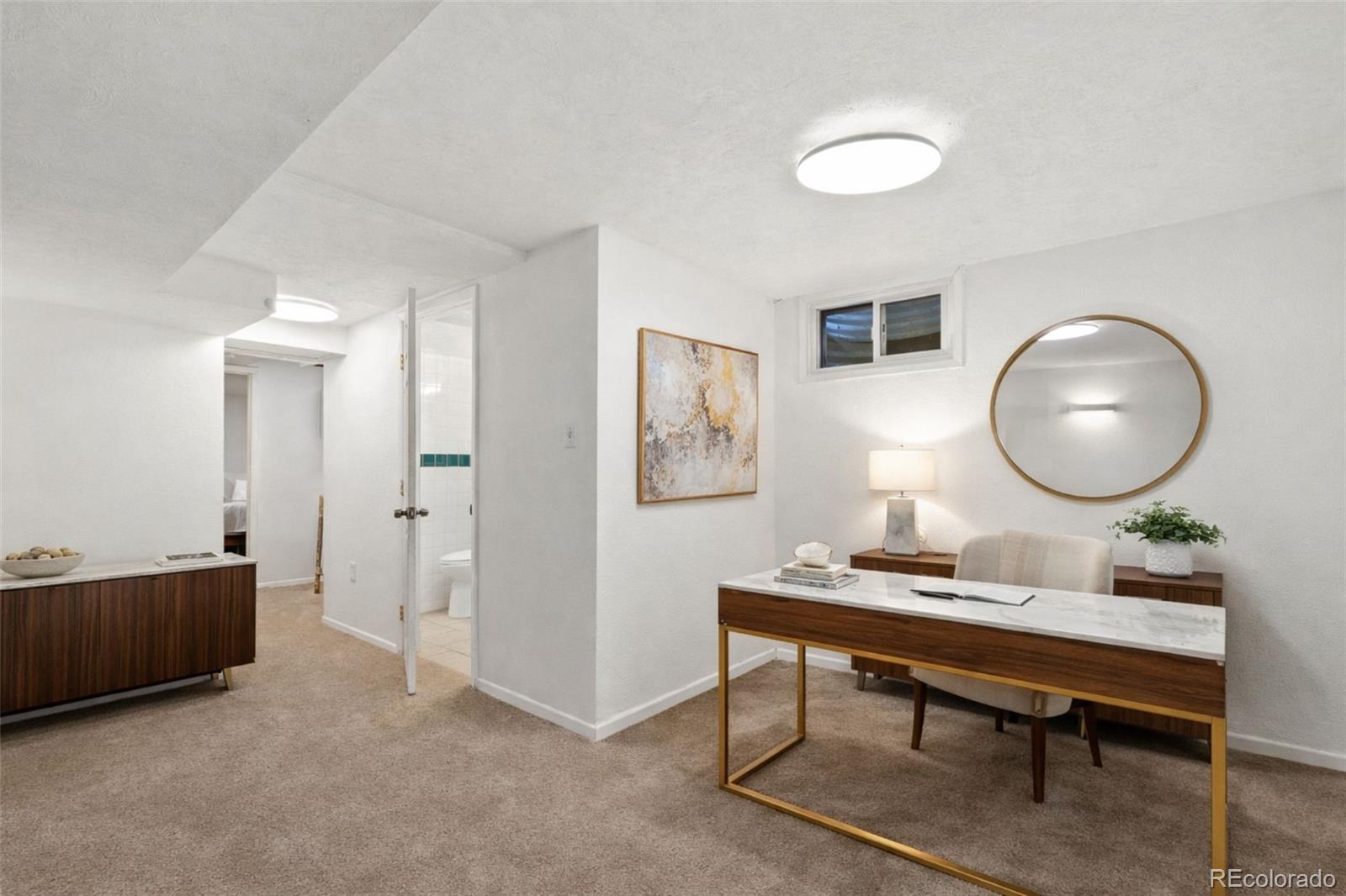 5533 Raritan Way Denver, CO 80221 - Photo 14 of 22 a view of a workspace with furniture