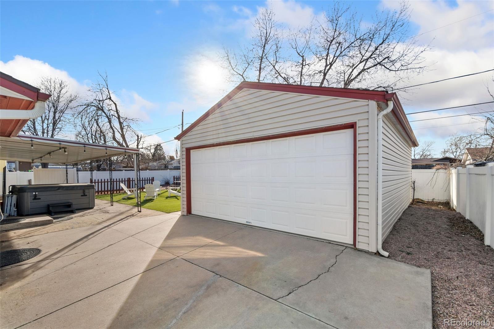 5533 Raritan Way Denver, CO 80221 - Photo 20 of 22 a view of a house with a backyard