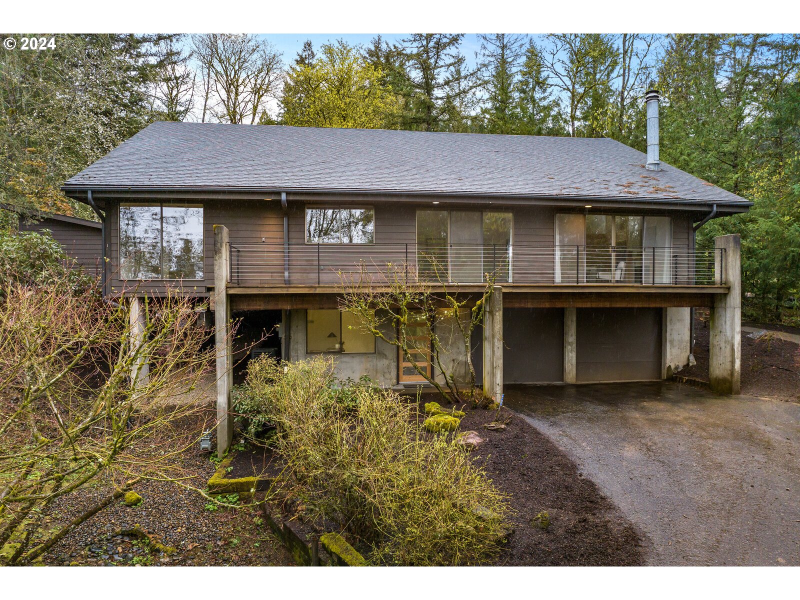 a aerial view of a house with a yard