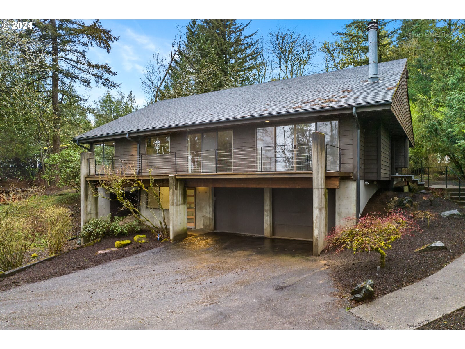3730 Southwest Shattuck Road Portland, OR 97221 - Photo 2 of 44 a view of a house with a garden