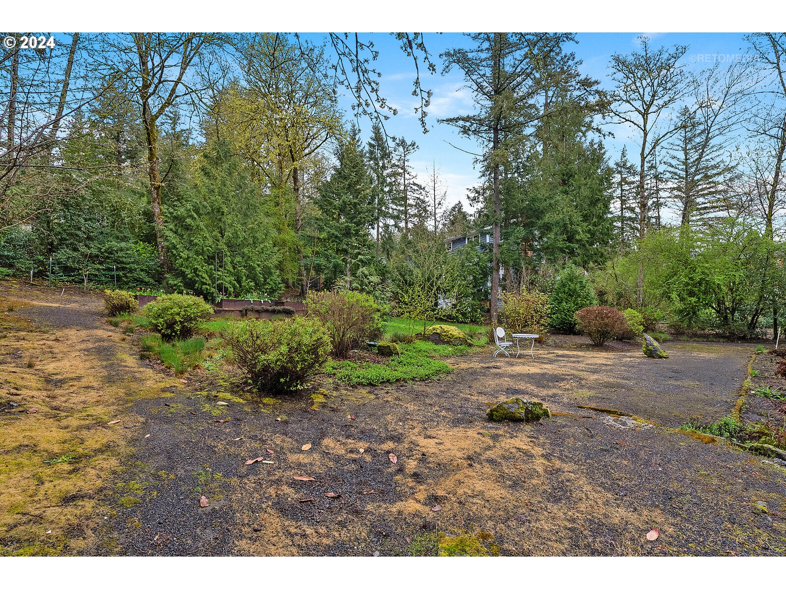 3730 Southwest Shattuck Road Portland, OR 97221 - Photo 28 of 44 a view of a yard with a tree