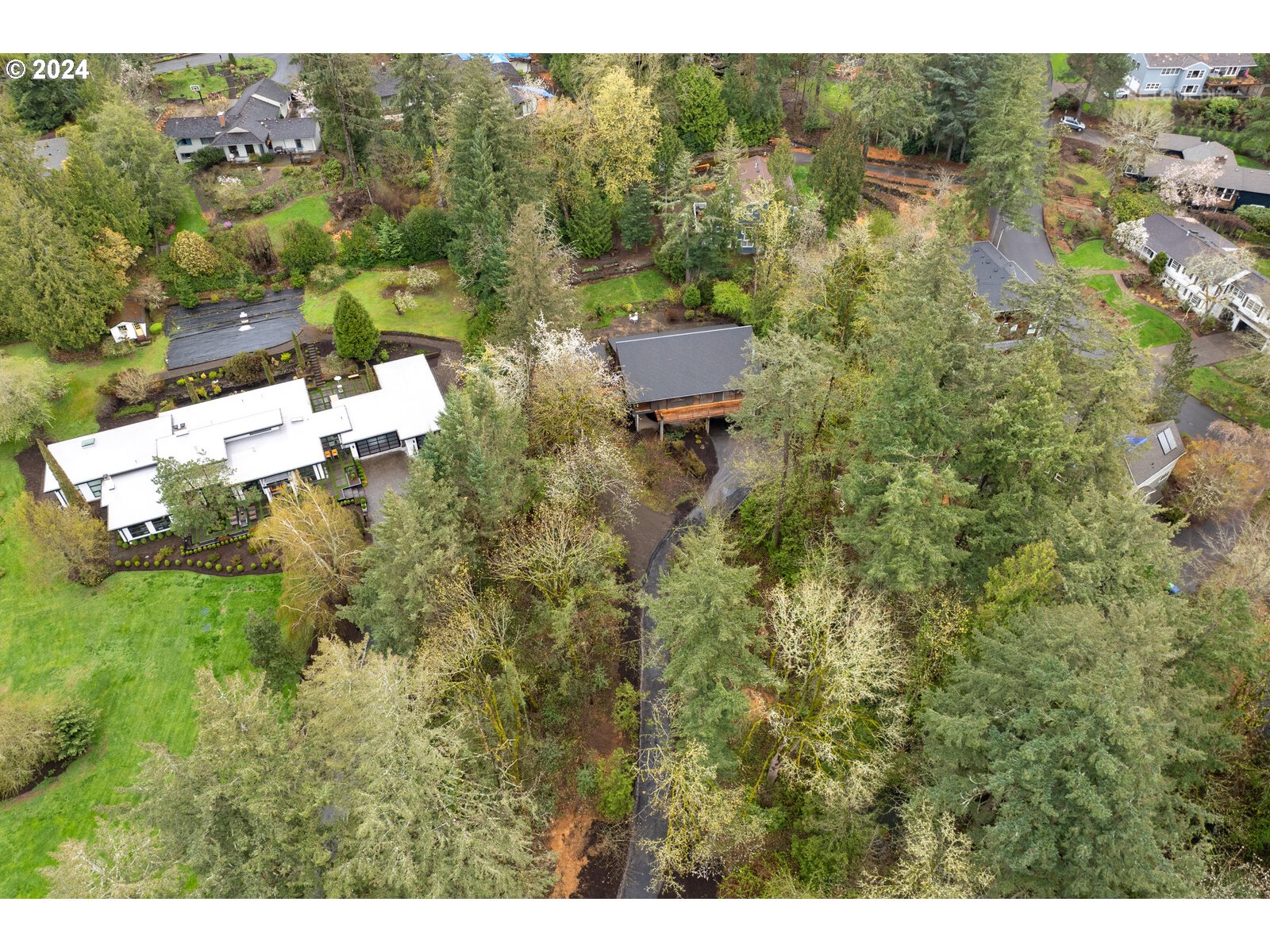 3730 Southwest Shattuck Road Portland, OR 97221 - Photo 36 of 44 a aerial view of a house with a yard