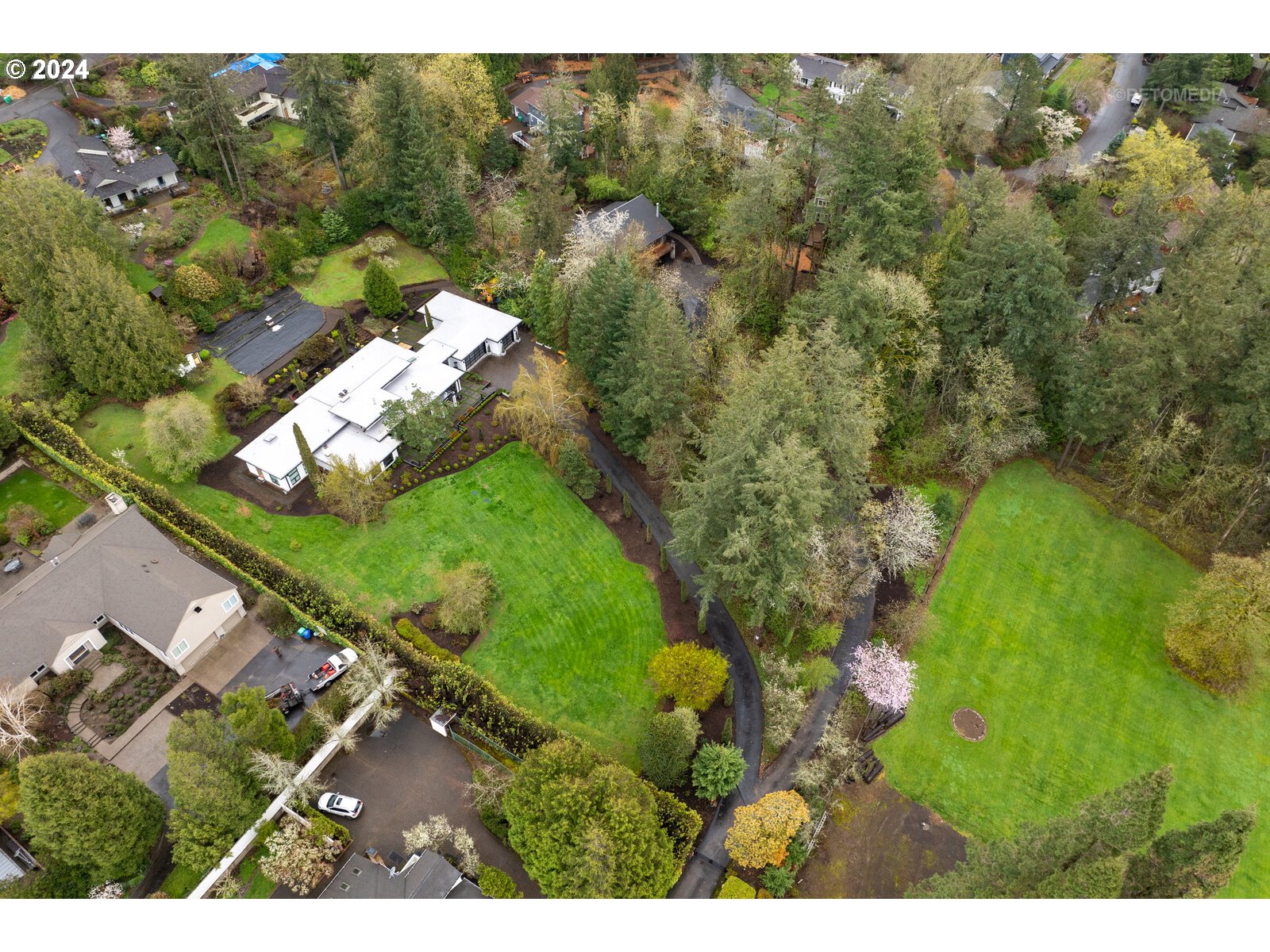 3730 Southwest Shattuck Road Portland, OR 97221 - Photo 38 of 44 a view of a lake with a yard