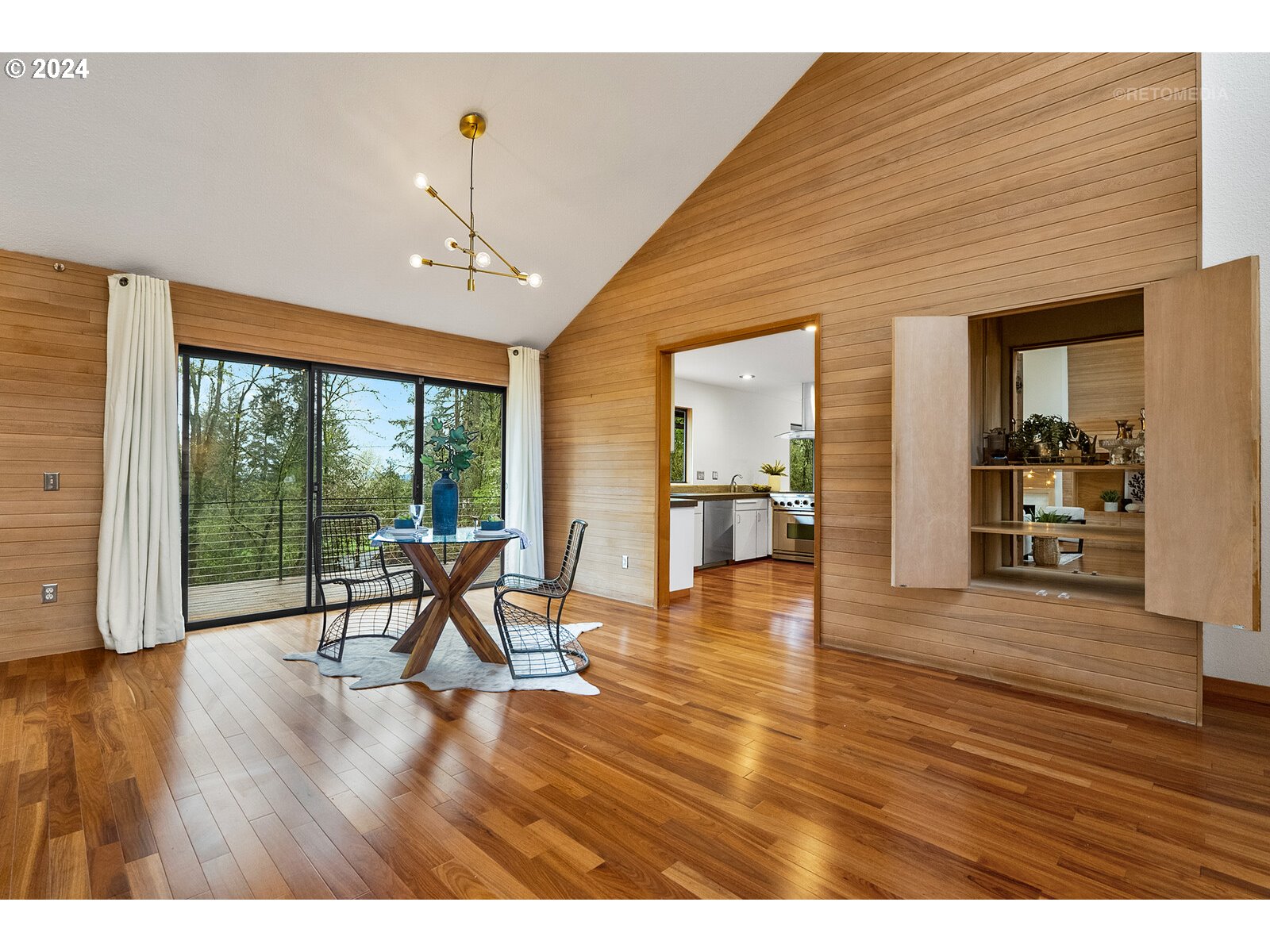 3730 Southwest Shattuck Road Portland, OR 97221 - Photo 6 of 44 a view of a livingroom with furniture wooden floor and windows
