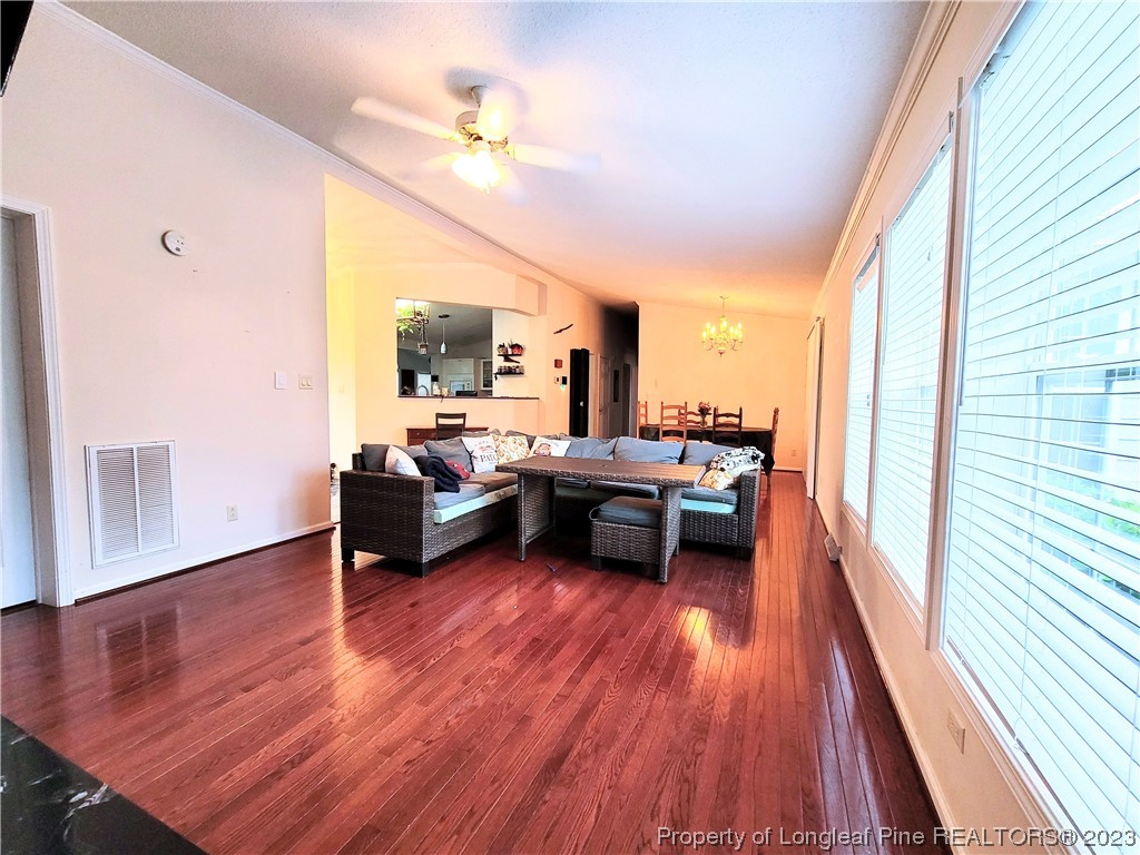 400 Ridge View Drive Cameron, NC 28326 - Photo 8 of 40 a living room with furniture and a wooden floor