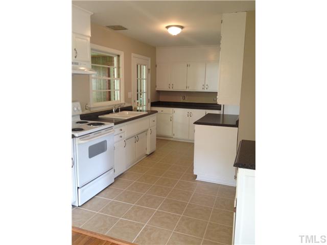 905 Powell Drive Raleigh, NC 27606 - Photo 2 of 11 You will love this incredible kitchen -- electric range, tile flooring, lots of cabinets, pantry, new countertops and new lighting! Plenty of counter space!