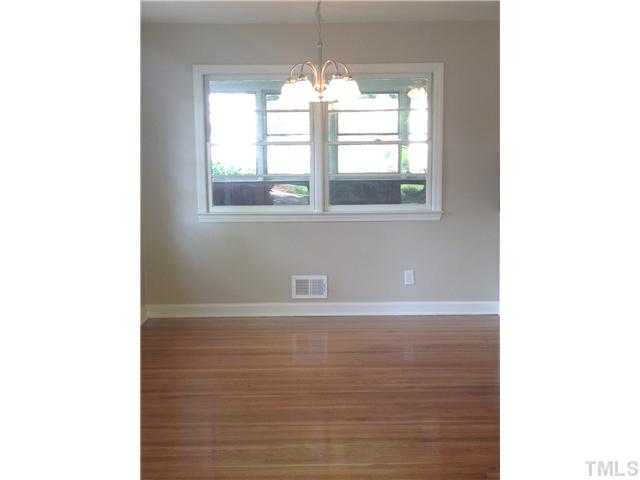 905 Powell Drive Raleigh, NC 27606 - Photo 10 of 11 Great dining room opens to kitchen and living.