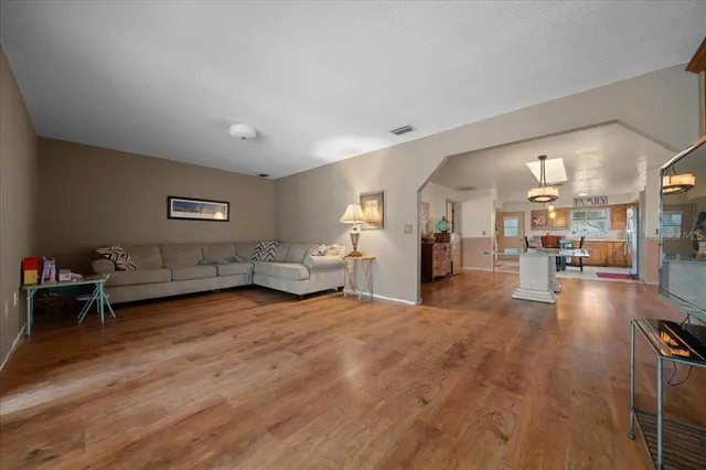 a view of a living room and dining room