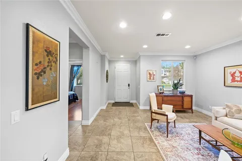 a kitchen with sink a counter top space appliances and cabinets
